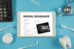 dental insurance toothache doctor patient work paper claim insurance saving benefits product toothbrush top view Blog